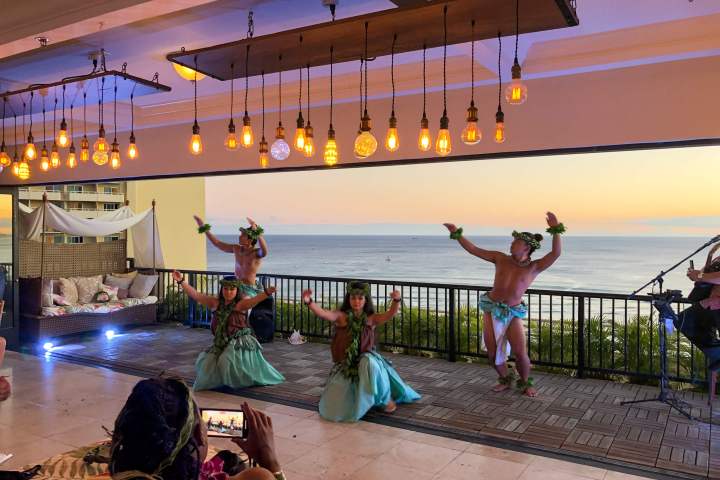 a group of people sitting at a table