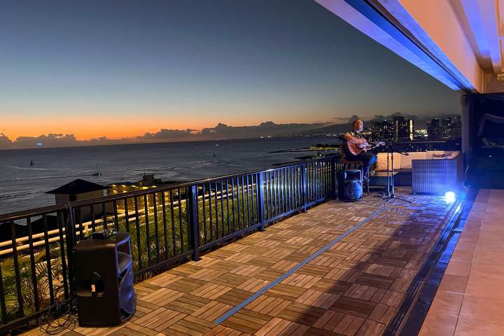 a person standing in front of a pier