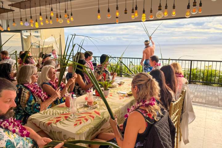 a group of people sitting at a table